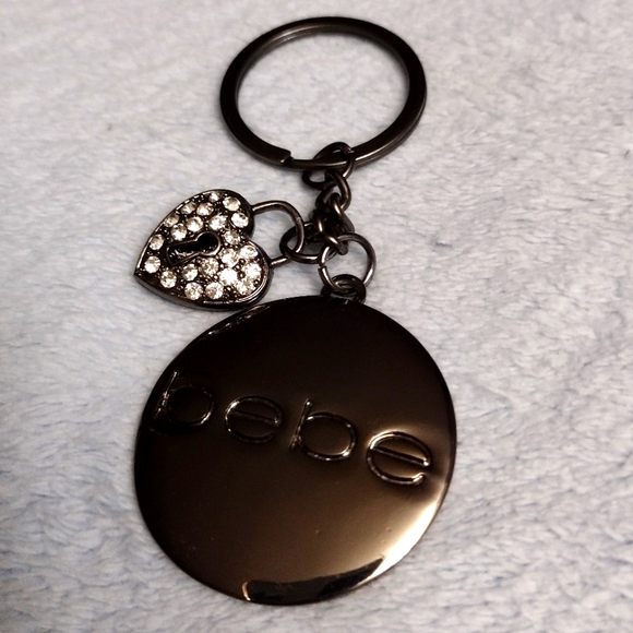 bebe Handbags - NEW IN BAG BEBE Shiny Bronze KeyRing/Bag Charm with Rhinestone Heart